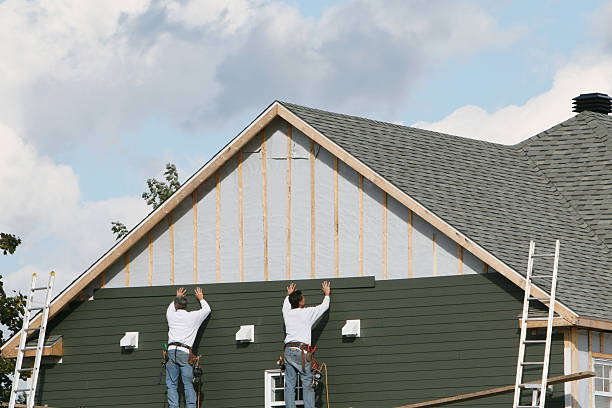 Professional Siding technician working in Somersville, CT